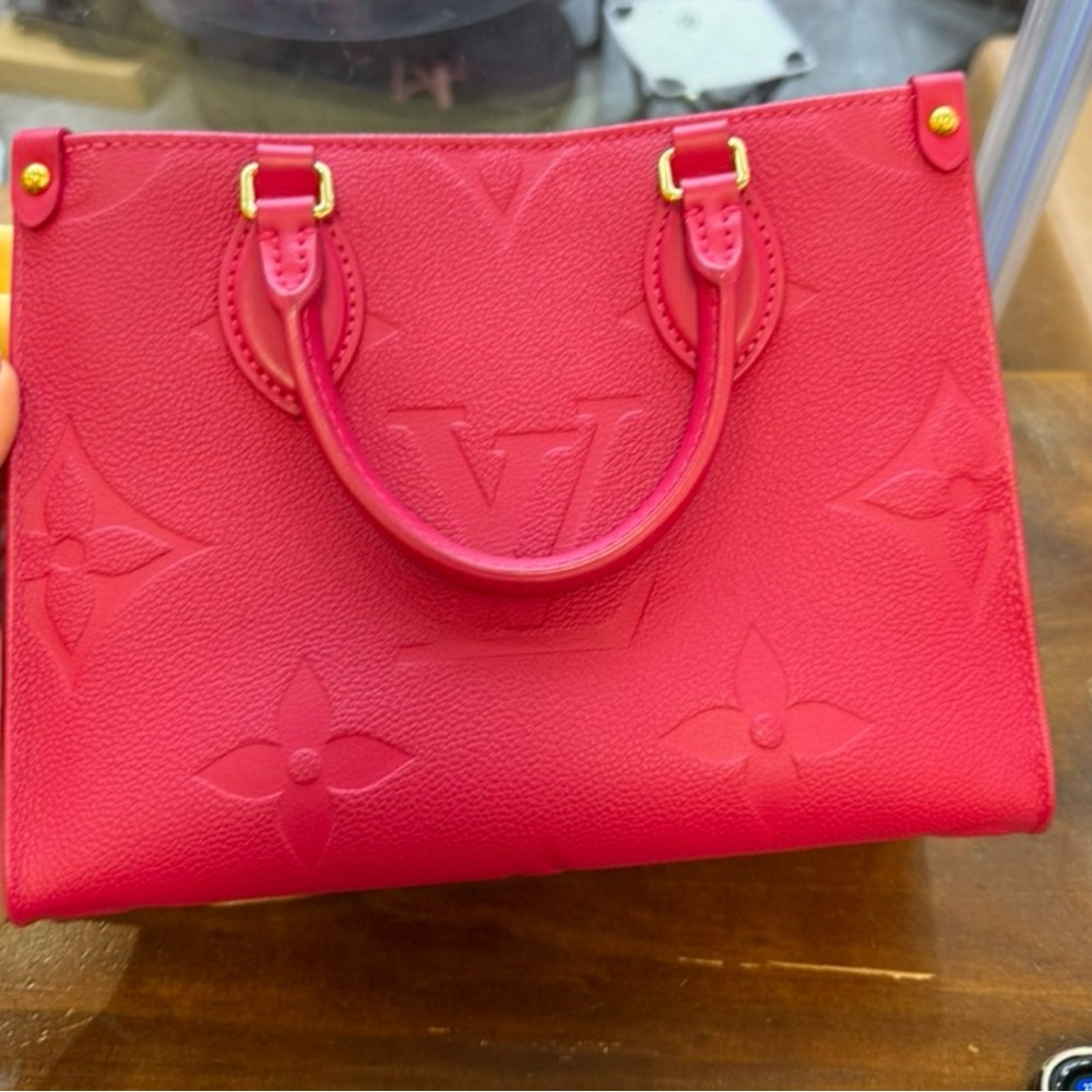 Louis Vuitton Pink OntheGo PM with Iconic Monogram